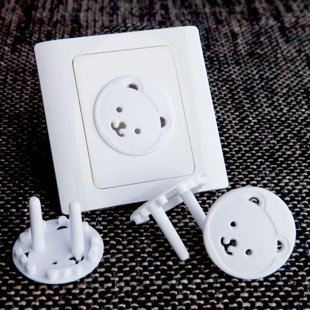 

10Pcs/lot White Cartoon Bear Two Phase Baby Security Product Children Elec cal Safety Protective Socket Cover Cap