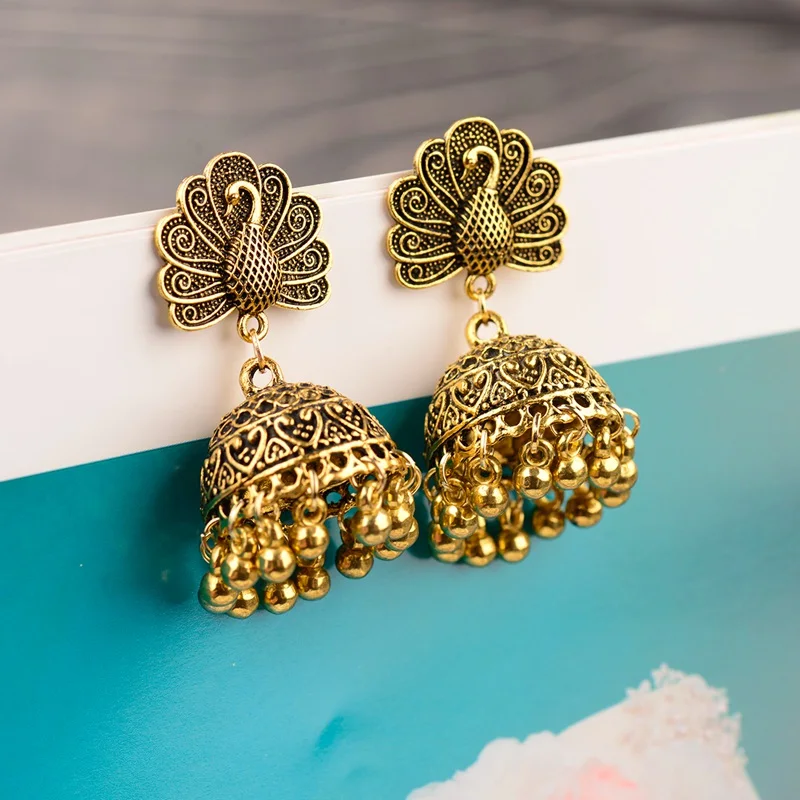 

OIQUEI Indian Jhumka Jewelry Small Bells Tassel Drop Earring Bohemia Ethnic Animal Carved Hanging Earrings For Women pendientes