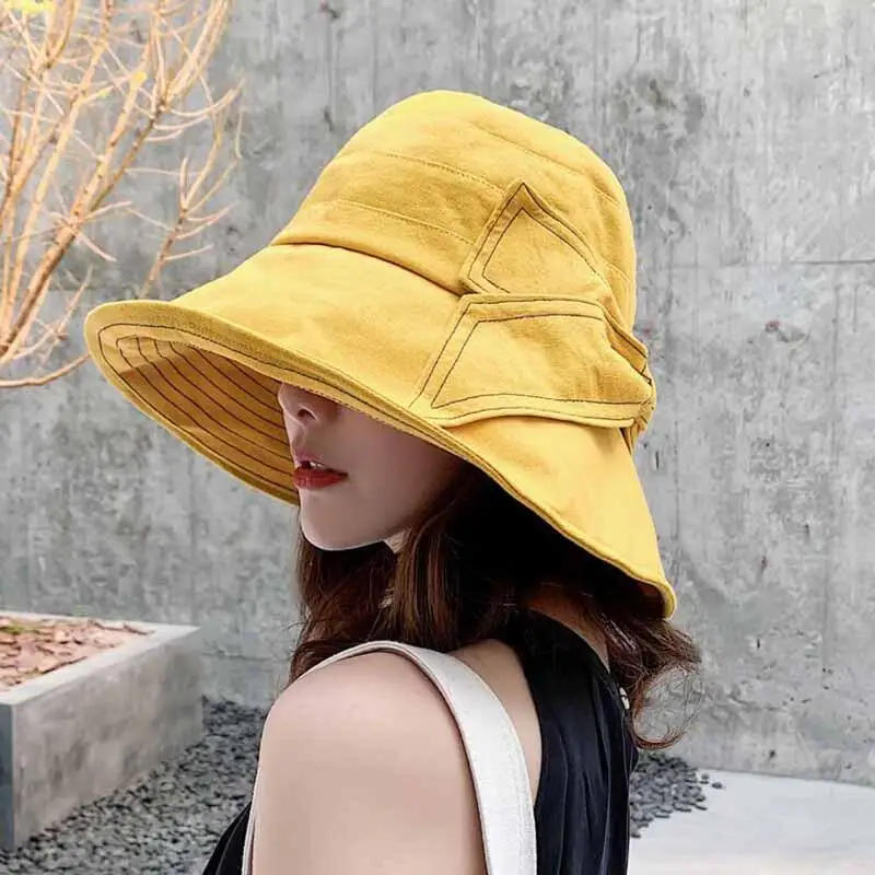 الصيف واسعة حافة قبعات للحماية من الشمس للنساء UPF50 الأشعة فوق البنفسجية طوي صياد القبعات في الهواء الطلق Bowknot قابل للتعديل Boonie دلو القبعات