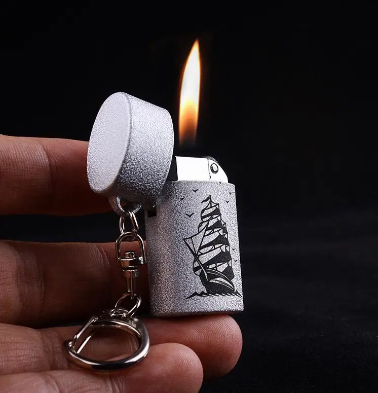

Keychain Petrol Lighter Mini Compact Kerosene Lighter Key Chain Capsule Gasoline Lighter Inflated Outdoor Tools 2pcs/lot