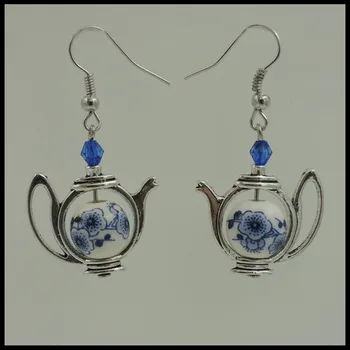 

Alice in wonderland inspired tea time 10mm blue flora crystal accent earring ER751