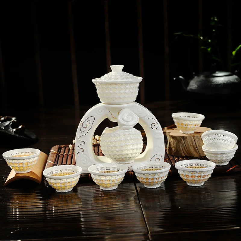Pure hand woven exquisite tea set automatic crystal hollow ceramic bone China Kung Fu of high-end gift box | Обустройство дома