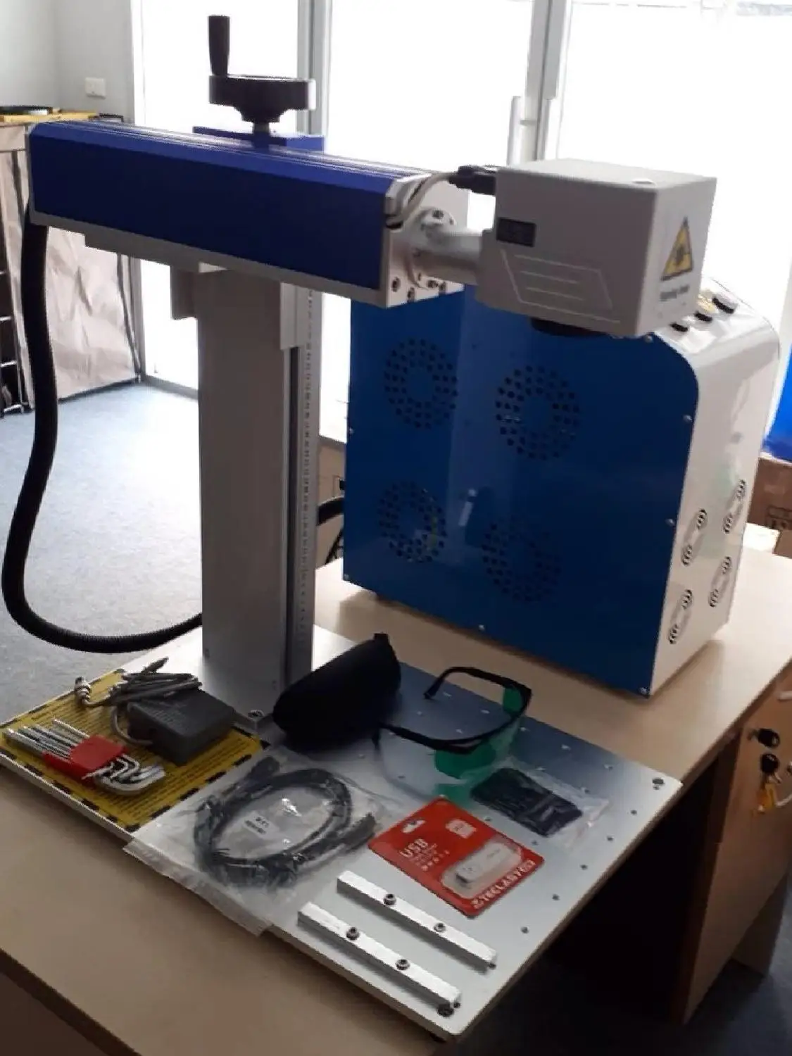 

Raycus 50w fiber laser marking machine with rotary tools have a good price