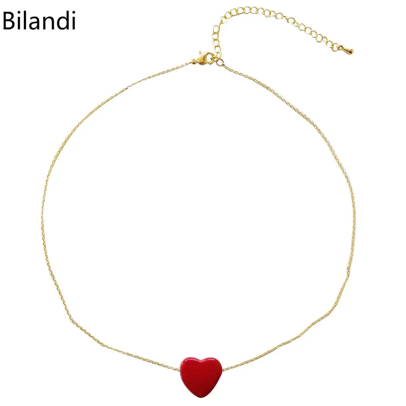 

Simply Jewelry Gold Chian With Red Acrylic Heart Pendant Necklace For Woman