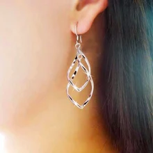  Fashion Double Swirl Loop Hollow Drop Earrings For Women Long Wave Dangle Earrings High Quality Hanging Earrings Female Jewelry 
