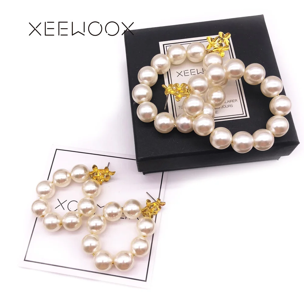 

Gold Flower Vintage Style Circular Pearl Earrings Romantic Designer Gold Earrings Grace Creative Drop Earrings For Women Gift