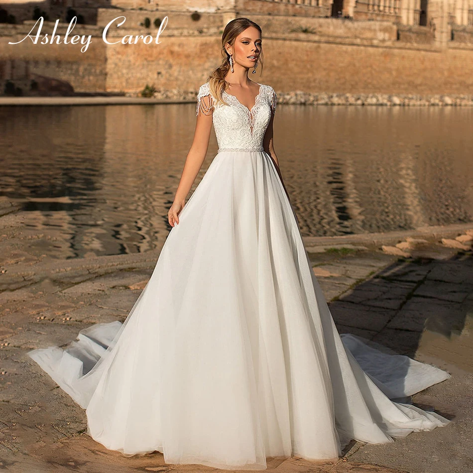 

Ashley Carol Sexy V-neck Short Tulle Wedding Dresses 2019 Beaded Simple Chapel Train A-Line Bride Dress Glamorous Wedding Gowns