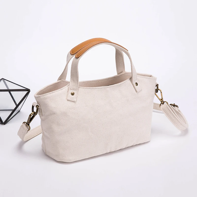 

Canvas large capacity tote designer handbags high quality Casual Tote Zipper Soft material handbag shoulder bag