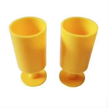 

Free shipping 2 sets yellow cups flying coins Cups magic tricks magic cups