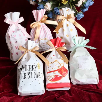 

50 Pcs High Quality Cute Cartoon Multi-Color Christmas New Year Candy Cookie Drawstring Bags Kids Gift Bags for Merry Christmas