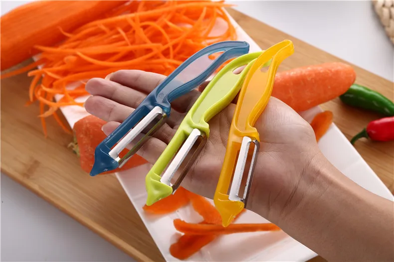 

2pcs/lot Fashion Useful Fruit Slices Potatoes Apple Peeling Multifunctional Peeler Tools High Quality Hot Sale kicthen OK 0770