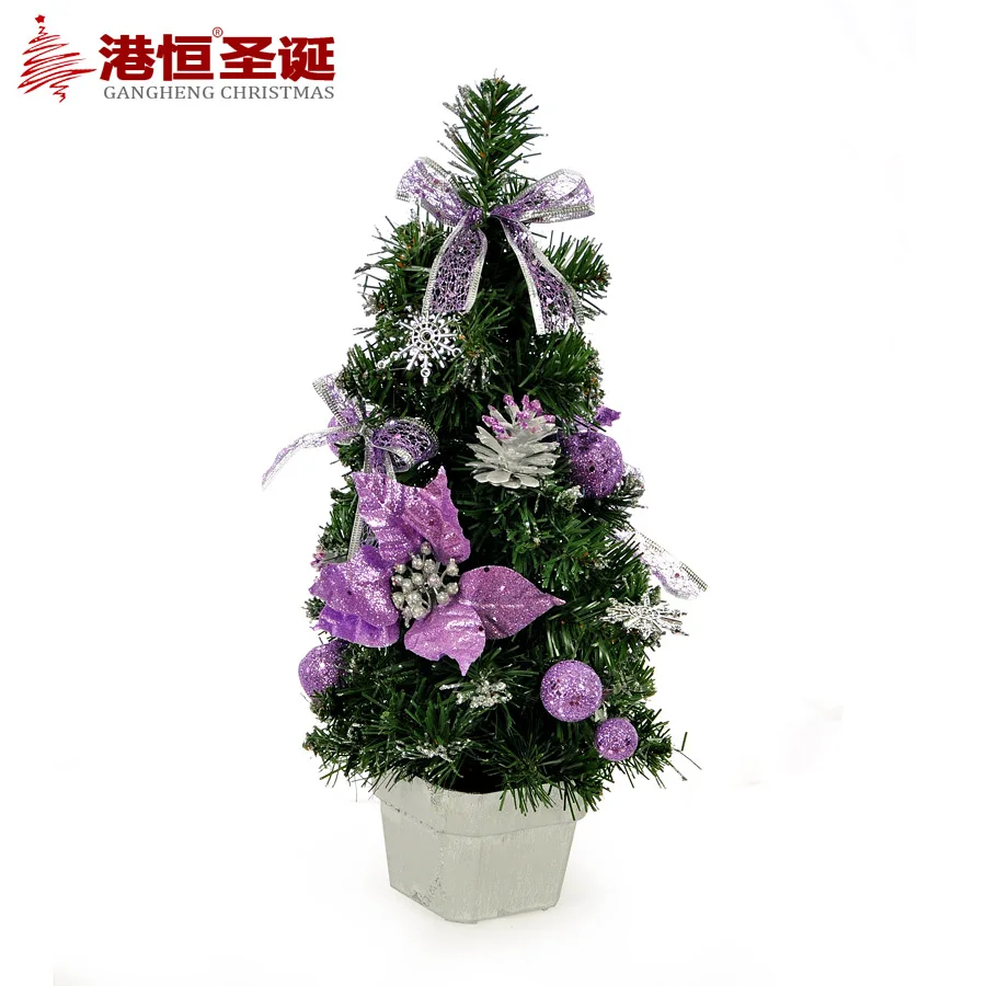 Christmas ornaments arranged in silver and purple decorate Christmas