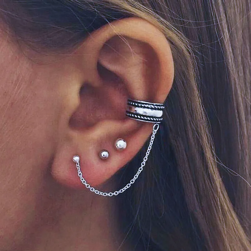 Серьга на хрящ с проколом как называется. Серьги с цепочкой на хрящ. Прокол хеликс 3 серьги. Моносерьга кафф. Прокол хеликс серьги.