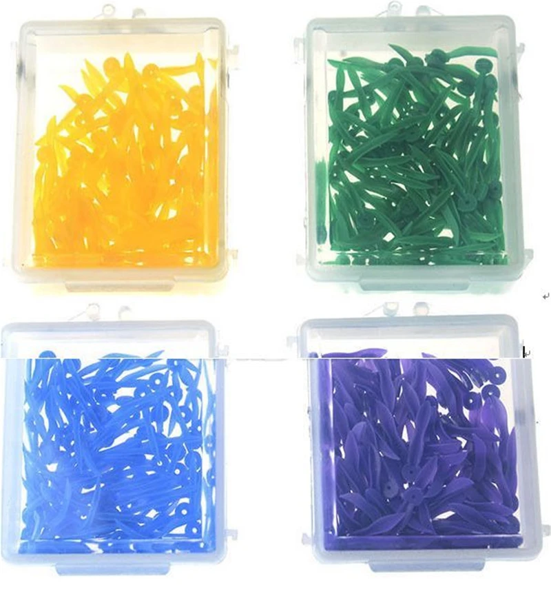 400pcs-Dental-disposable-Plastic-Wedge-With-Hole-All-4-sizes-wave-shape-Wedge (1)