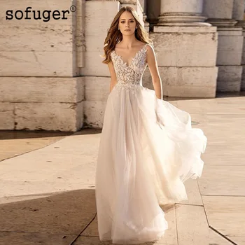 

Beach Princess Backless Appliques V Neck Wedding Dresses Robe De Mariage 2019 Custom Made Available White Ivory