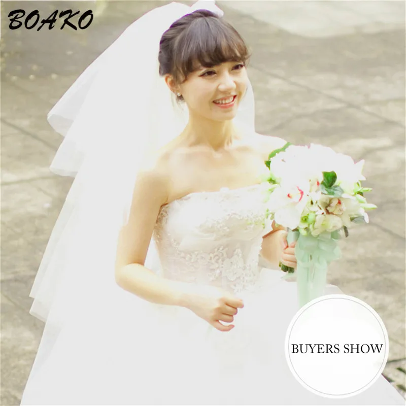 BOAKO Cut Edge Puffy Tulle Bridal Veil Fingertip Length Elegant Wedding Veil With Comb 4 Layer White Champagne Velos De Novia