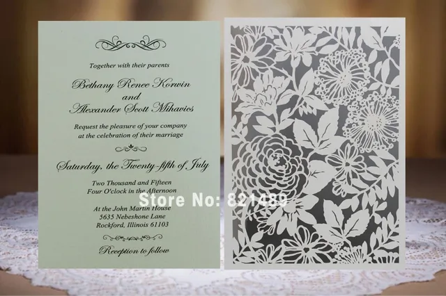white laser cut invitation
