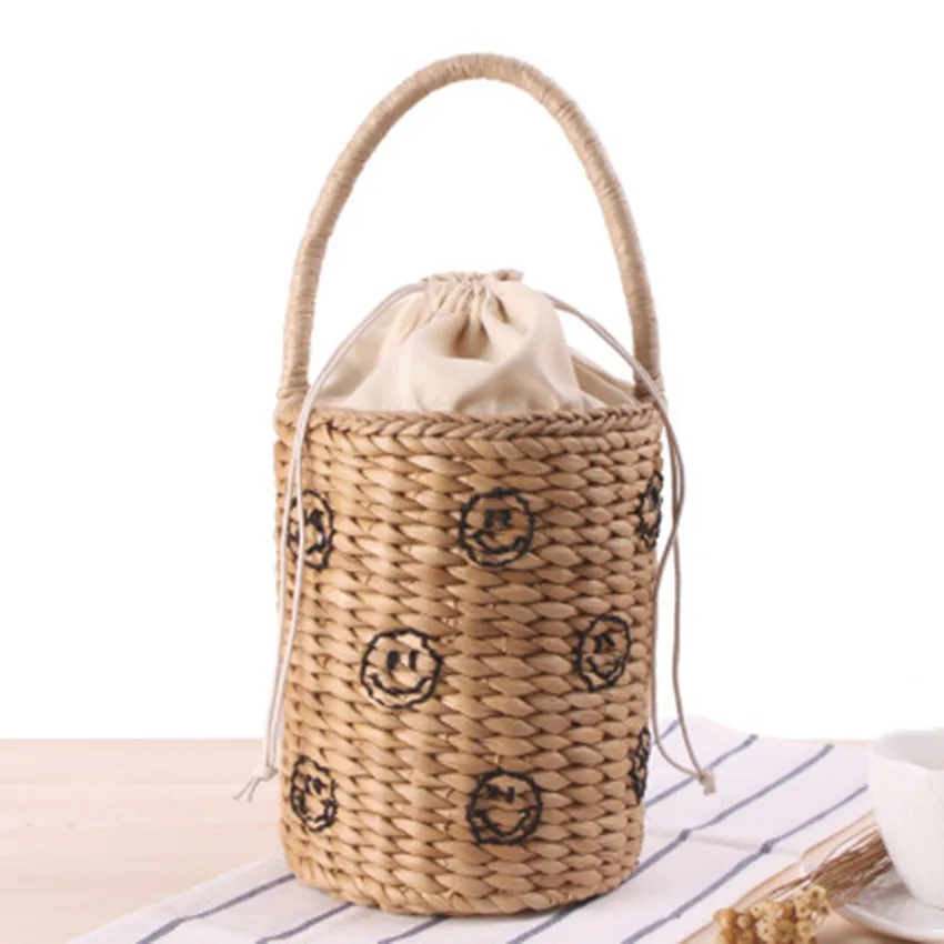 

British wind portable bucket woven bag hand carry hand embroidery stars smile face straw bag summer vacation beach bag