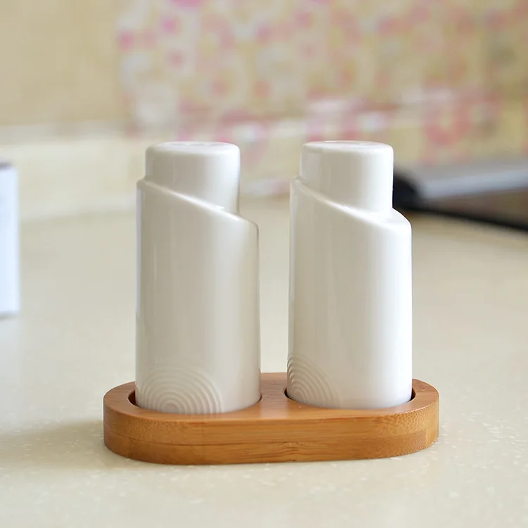 

Two Pieces Set With Stand Ceramic Pepper Shaker Creative Kitchen Tools Spice Storage Jar Pepper Bottle Free Shipping