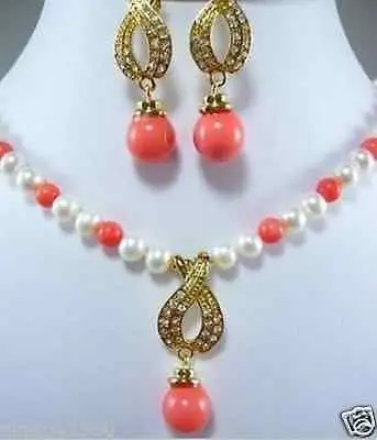 

Hot sale Free Shipping>>7-8MM White Cultured Pearl /Pink Coral Necklace Earring Set AAA