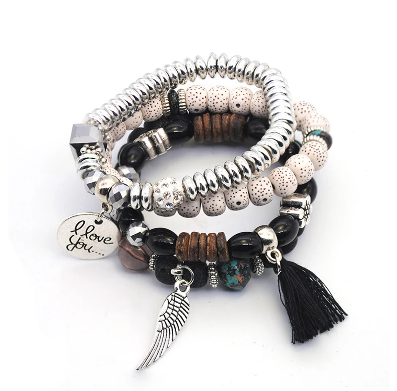 Linden-tree-wood-bracelet-with-tassel-angle-wing-charm_05