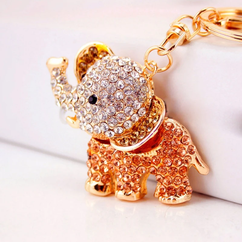 

Novelty Charm Glitter Crystal Carousel Car Keychain Trojans Keyring Women Handbag Bag Key Chain Ring Holder