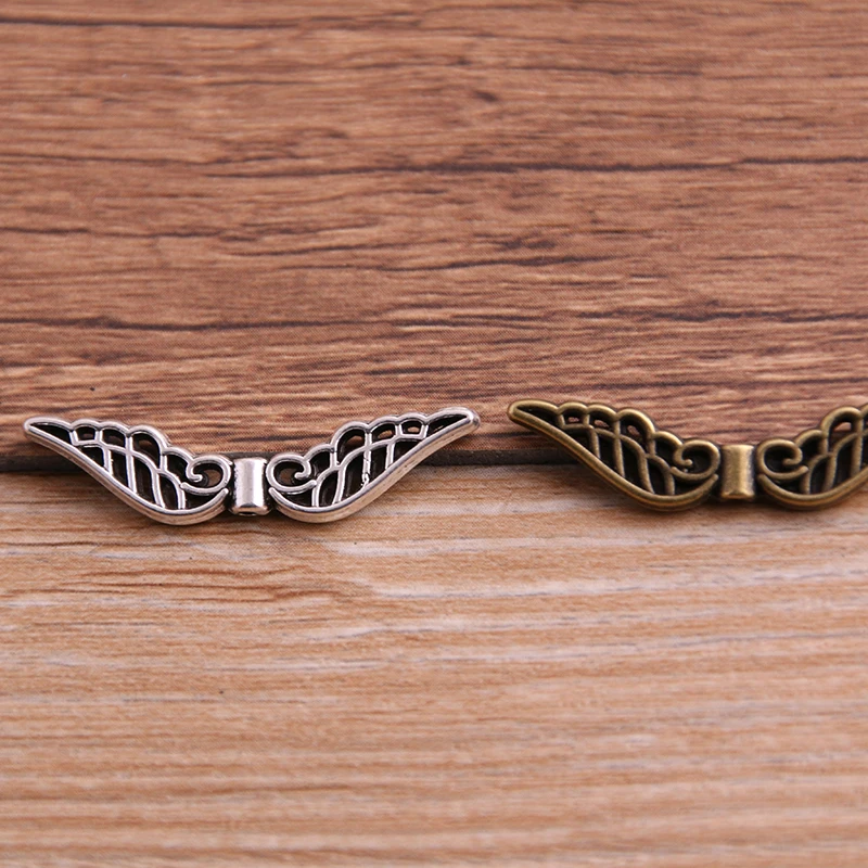 

PULCHRITUDE 20pcs 7*31mm Angel Wings Beads for Jewelry Making DIY Metal Wings Beads Trendy Vintage Crimp & End Beads P6475