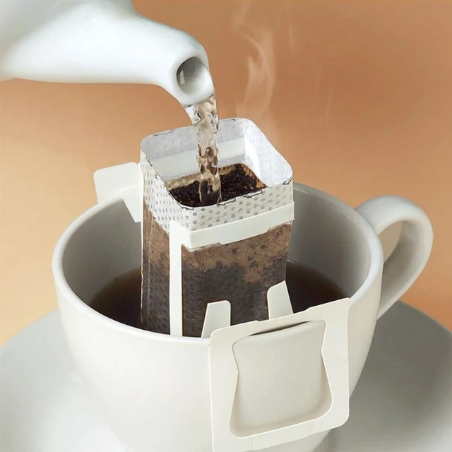 Special Price 50Pcs / Pack Drip Coffee Filter Bag Portable Hanging Ear Style Coffee Filters Paper Home Office Travel Brew Coffee Bolsas de te Special Price 50Pcs / Pack Drip Coffee Filter Bag Portable Hanging Ear Style Coffee Filters Paper Home Office Travel Brew Coffee Bolsas de te