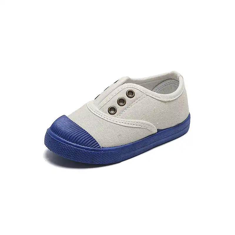 little girl white canvas tennis shoes