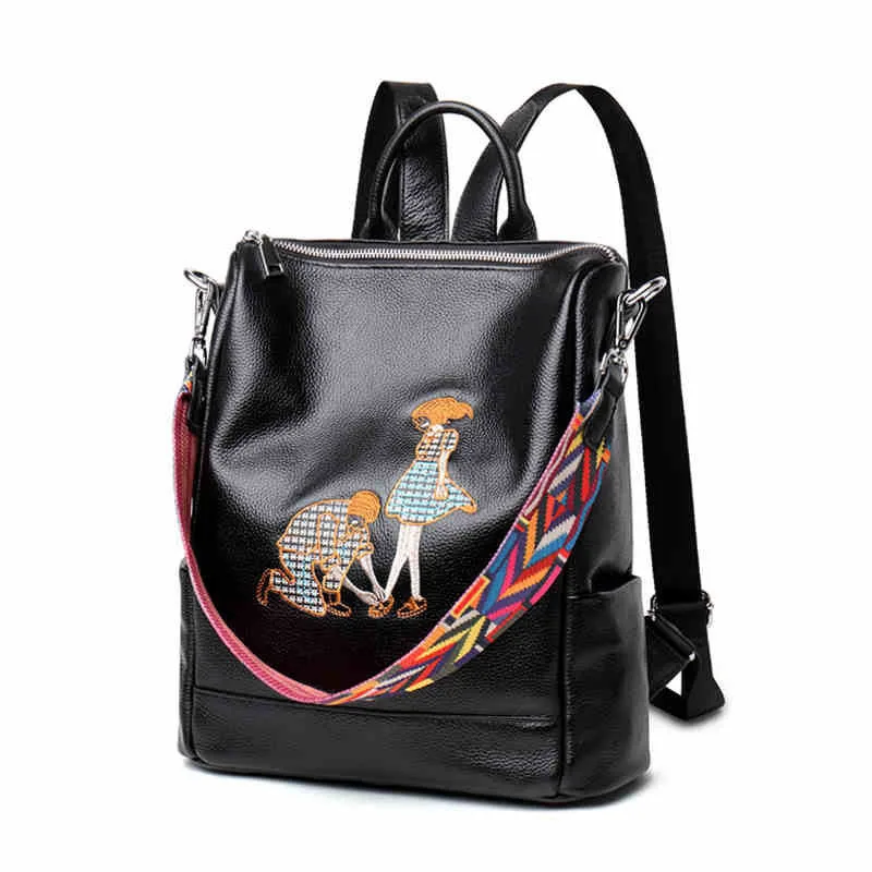 

Women's Korean version of the leather vertical shoulder bag Simple header of the leather shoulder bag embroidery dual-purpose ba