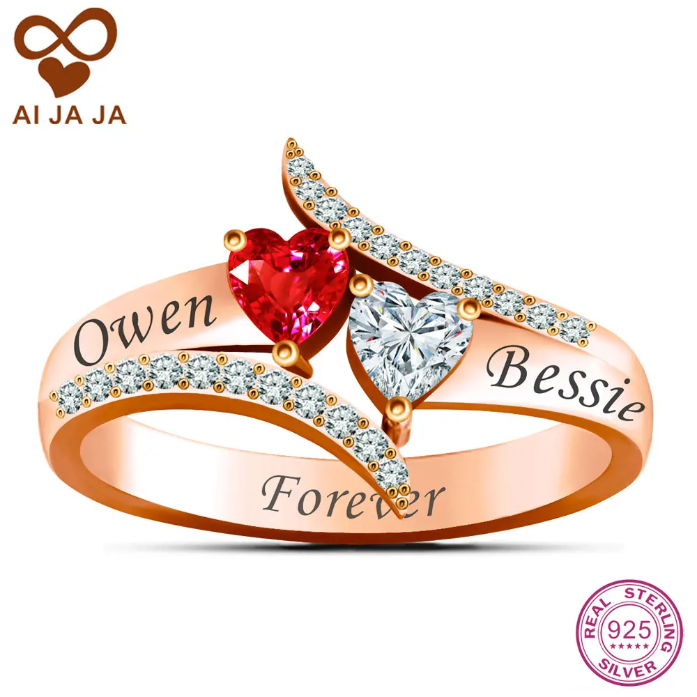 Silver heart ring with white stones in the middle names jcpenney