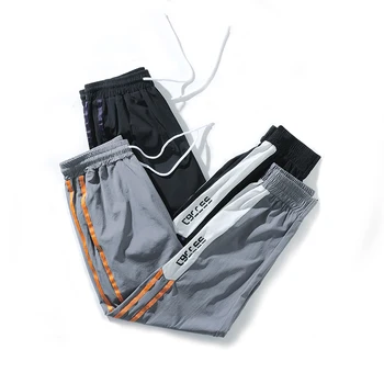 

Men's pants polyester quick-drying jogging pants men's casual nine pants youth fashion outdoor sports pants 2018 Autumn new 5XL
