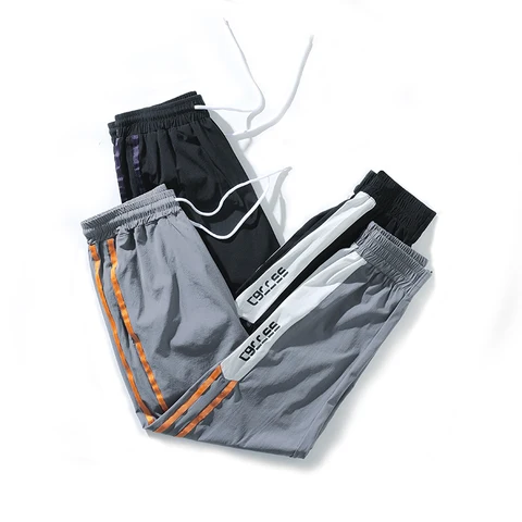 Calças de Jogging Moda ao ar Calças Masculinas Poliéster Secagem Rápida Casual Nove Juventude Livre Esportivas 2020 Outono Novo 5xl