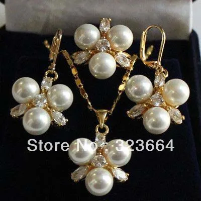 

Bright white shell pearl pendant earrings ring set