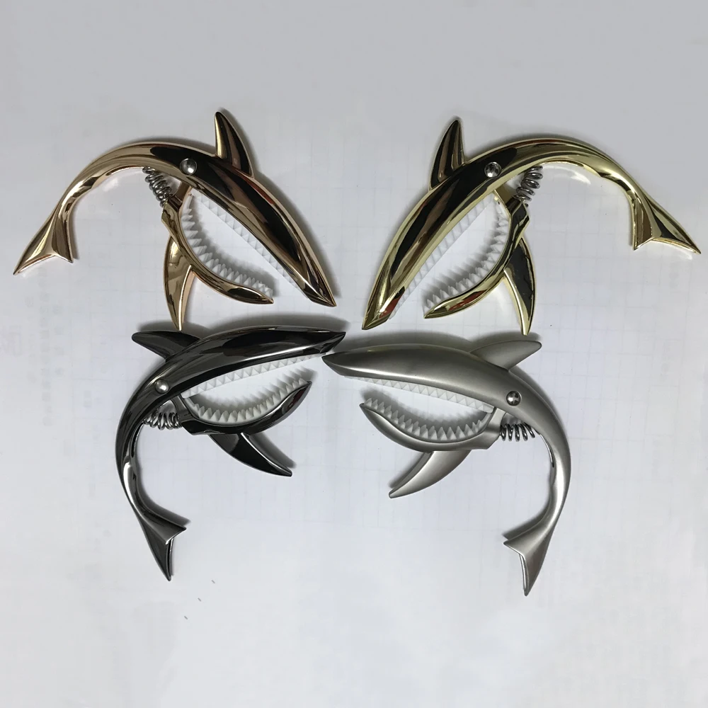 Tiburón Guitar Capo aleación de Zinc Universal Quick Change Clamp para acústica clásica Guitarra eléctrica instrumentos musicales Accesorios