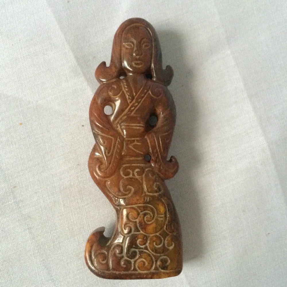 The depiction of antique jade in ancient womenin Figurines