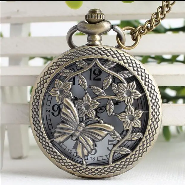 女性のための創造的なレトロなブロンズデザインの時計透かし彫りのバタフライと花が付いた古典的なチェーン女性のためのジュエリー
