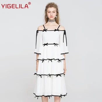 

YIGELILA Fashion Women Slash Neck Dress Summer Spaghetti Strap Flare Sleeve Bow Patchwork Empire Slim Mid Length Dress 63207