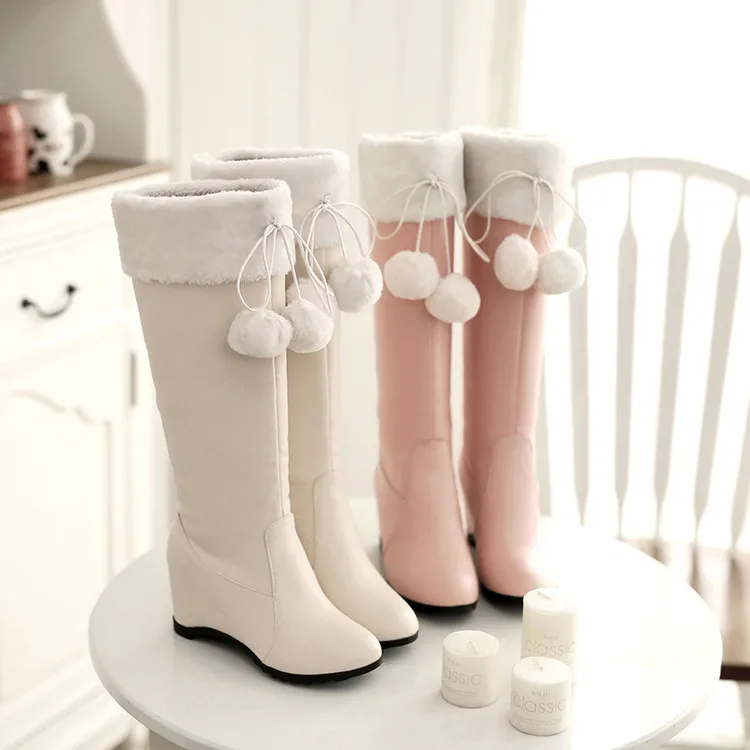 

Autumn and winter new bow fur ball warm women's boots increased long tube snow boots large size women's boots.