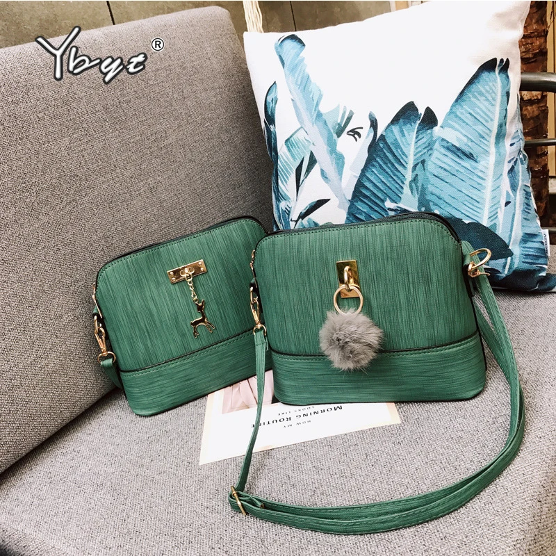 YBYT العلامة التجارية 2018New النساء Crossbody أكياس بسيطة أزياء قذيفة شكل النساء صغيرة رسول حقيبة كتف السيدات حار بيع حقيبة عادية YBYT العلامة التجارية 2018New النساء Crossbody أكياس بسيطة أزياء قذيفة شكل النساء صغيرة رسول حقيبة كتف السيدات حار بيع حقيبة عادية