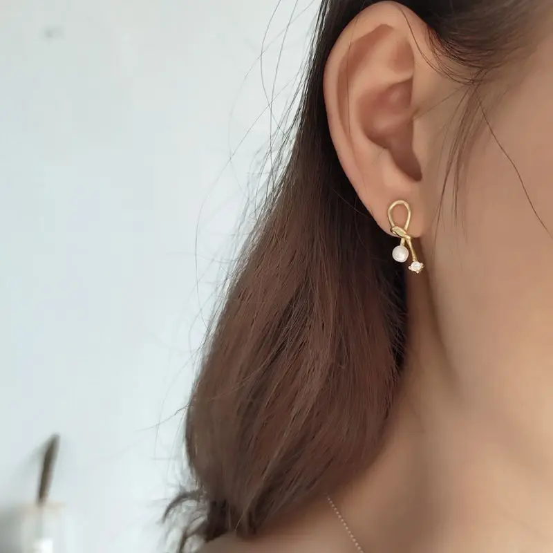 

Silvology 925 Sterling Silver Olivet Bow Earrings Gold Zircon Nordic Style Creative Chic Stud Earrings For Women 2019 Jewelry