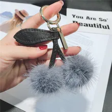Luxury Real Mink Fur Pom pom Leather Keychain Cherry Keyring Bag Charm Fluffy Bag Pendant PomPom Key chains holder chaveiro Gift Luxury Real Mink Fur Pom pom Leather Keychain Cherry Keyring Bag Charm Fluffy Bag Pendant PomPom Key chains holder chaveiro Gift