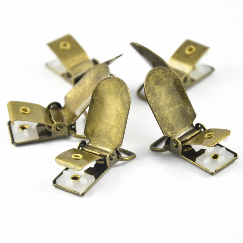 

1.5CM Antique Bronze Metal Lead Free Suspender Trousers Pacifier Paci Clips For Craft Ribbon Project Sewing Plastic Insert 9pcs