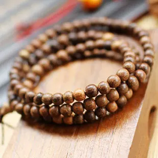 Whole Tibet Jewelery High Quality Vietnam Natural Agarwood Whole Tibet Jewelery High Quality Vietnam Natural Agarwood Mulurn Buddha Bracelet 6mm Men Women Gift Religion Charm In Strand Bracelets From