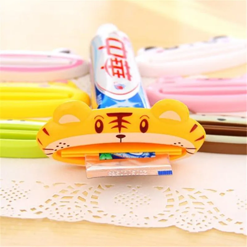 FEIGO 1Pc Cute Animal Multifunction SqueezerToothpaste Squeezer Home Tube Rolling Holder Squeezer Easy Toothpaste Dispenser F102