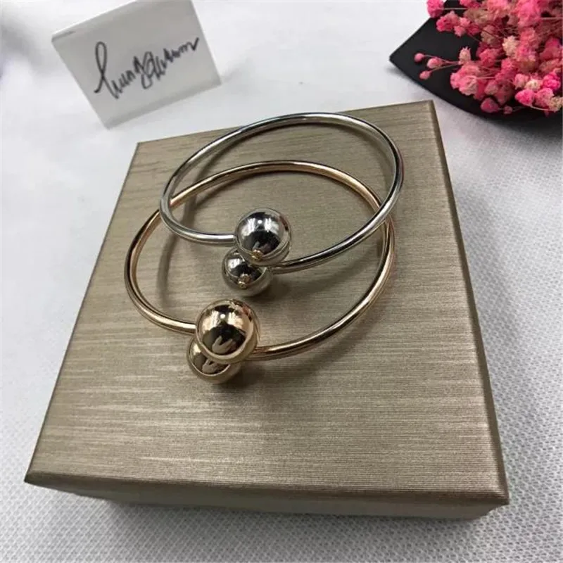 

TIF 925 sterling silver bracelet, classic open shape creative ball head. Adjustable size ladies gift free shipping