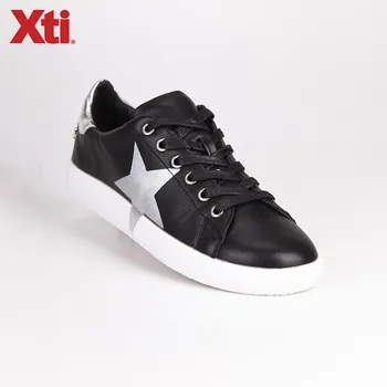 

Lace-up sneakers with star print