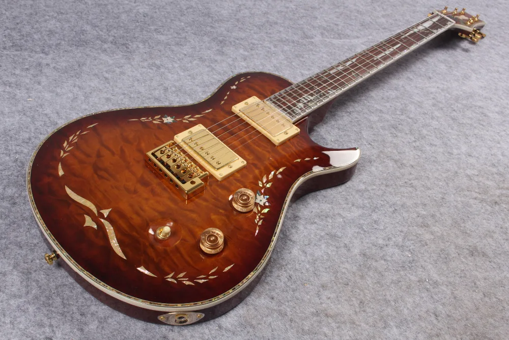

Shell Mosaic refers to the plate and the body P RS Electric Guitar top mahogany body water ripple surface