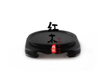 

The circular stone teapot base mahogany ebony Tianyuandifang whole wood round stone jade vase.