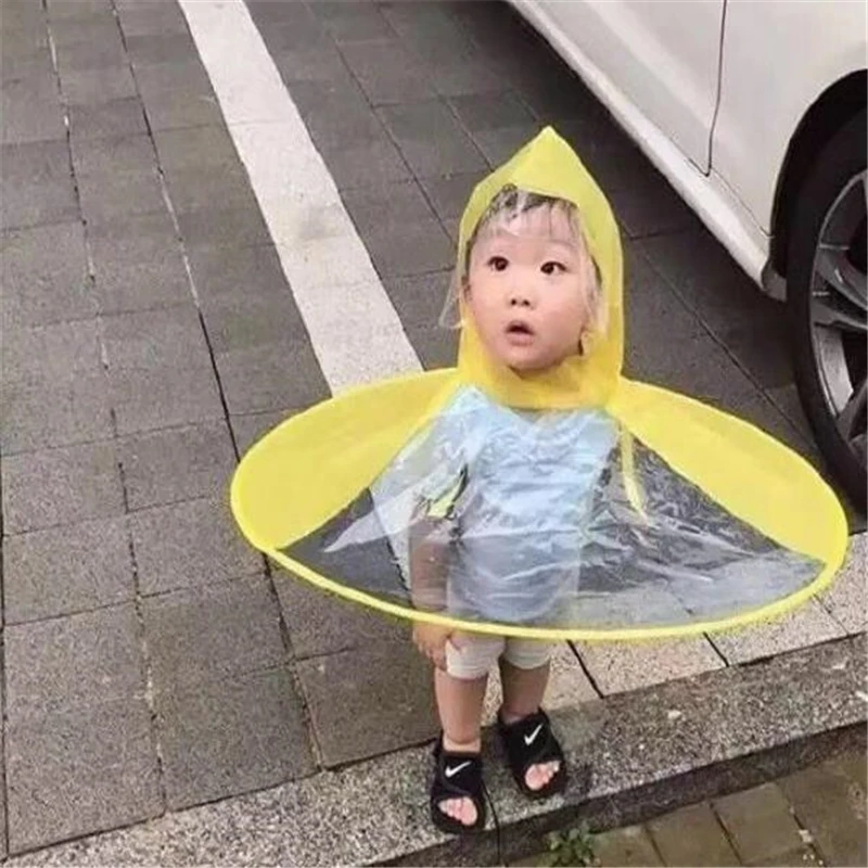 

Creative Children Adult Animation UFO Umbrella Sleeveles Hat Raincoat Hat Umbrella Yellow Duck Flying Saucer Raincoat Animation